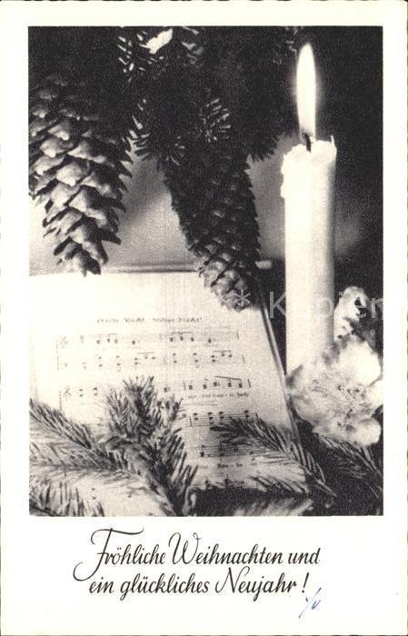 Tannenzapfen Kerze Notenblatt Weihnachten Neujahr