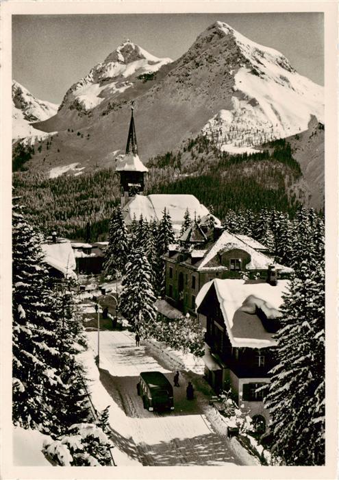 Arosa GR Dorfkirche Blick auf Furkahörner Winter