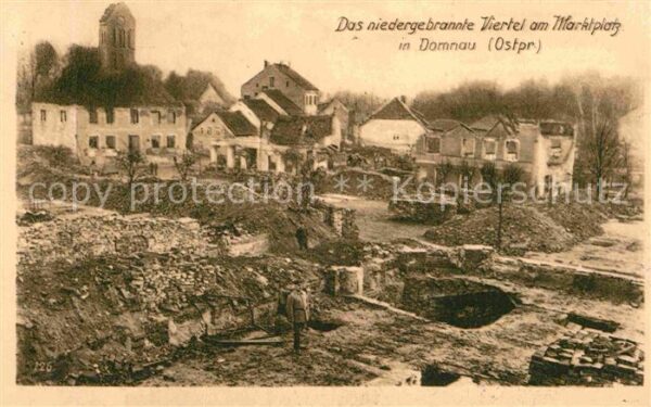 Domnau Ostpreussen Niedergebranntes Viertel am Marktplatz