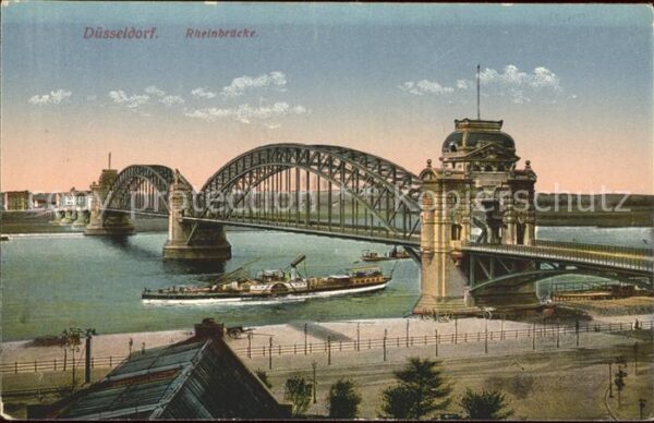 Duesseldorf Rheinbrücke Schaufelraddampfer