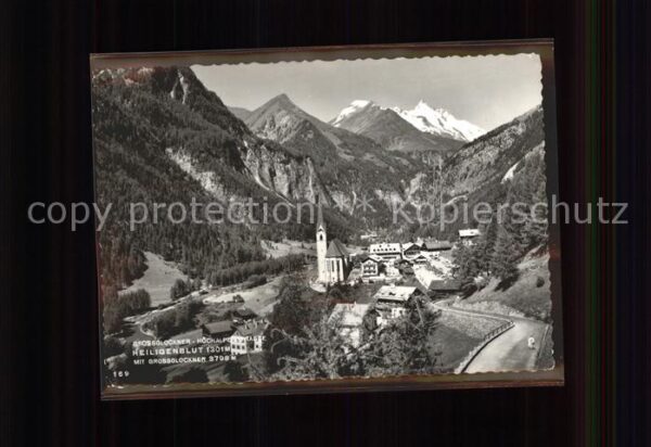 Heiligenblut Kaernten Ortsansicht mit Kirche Grossglockner Ho