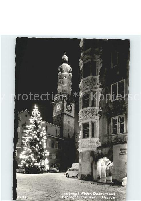 Innsbruck im Winter Stadtturm und Heblinghaus Wei