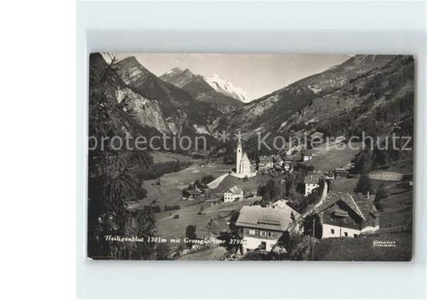 Heiligenblut Kaernten Ortsansicht mit Kirche Grossglockner Ho