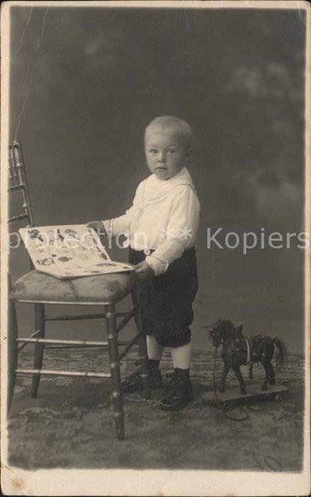Kinderspielzeug Rollpferd Kind Buch