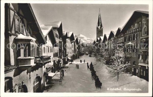 Kitzbuehel Tirol Hauptstrasse Kirchturm Pferdeschlitten