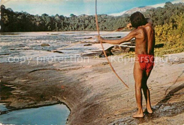 Suriname Amerindians hunting fish in the river