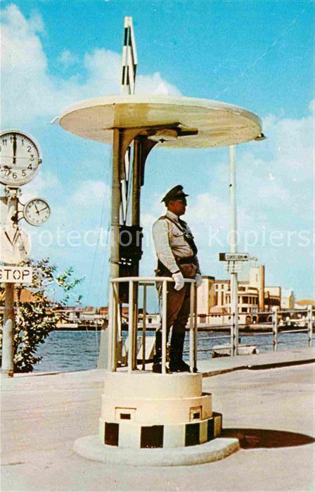 Willemstad Policeman directing traffic at foot of