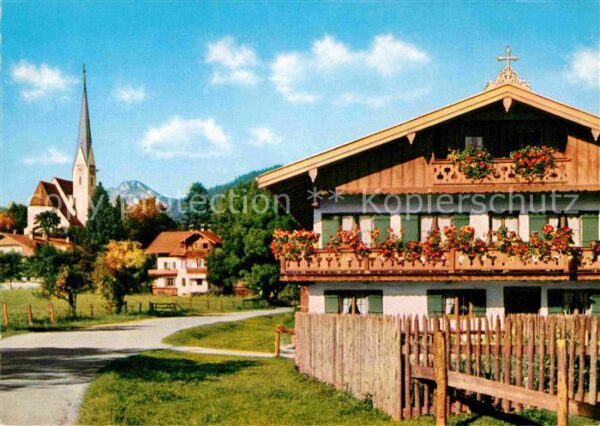 Bad Wiessee Blumenschmuck Ortspartie an der Kirche