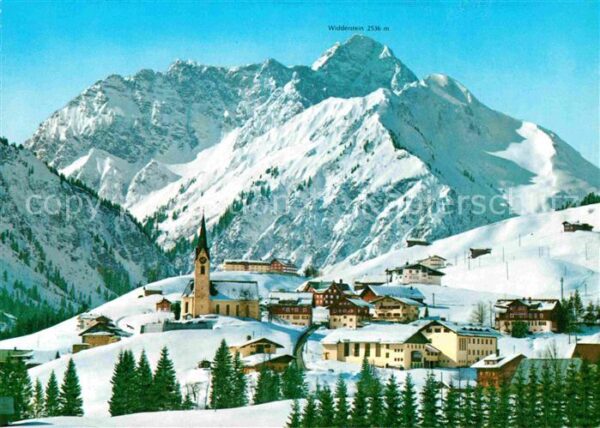 Hirschegg Kleinwalsertal Vorarlberg Ortsansicht mit Kirche Winterpanorama m