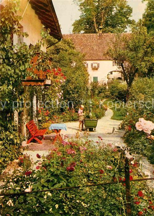 Bernried Starnberger See Blick über den Zaun Garten Kind Brunnen