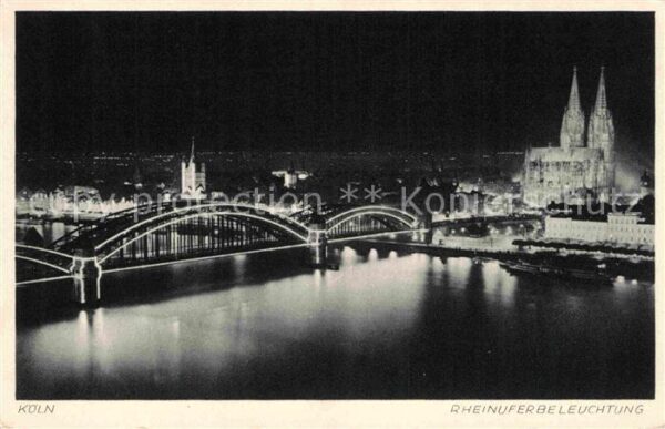 Koeln Rhein Rheinbrücke Dom bei Nacht