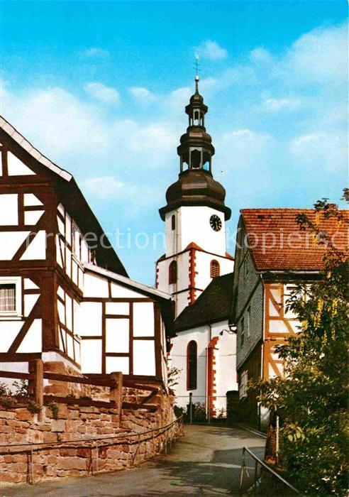 Bad Salzschlirf Partie an der Kirche Fachwerkhäuser