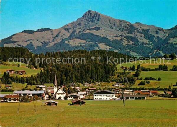 Reith Kitzbuehel Ortsansicht mit Kirche gegen Kitzbühele