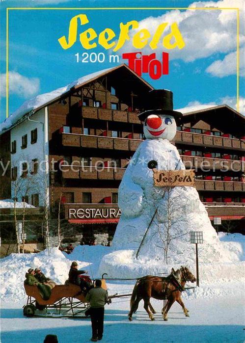 Seefeld Tirol Dorfplatz Riesenschneemann Pferdeschlit