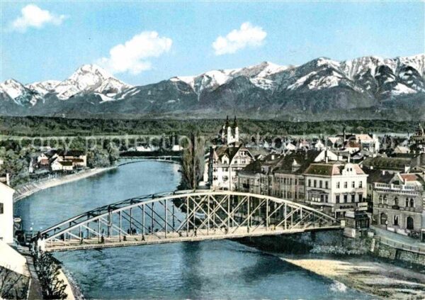 Villach Kaernten Drau Brücke mit Mittagskogel Karawanken