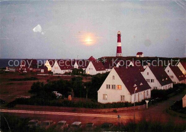 Westerland Sylt Ortsansicht mit Leuchtturm bei Sonnenun