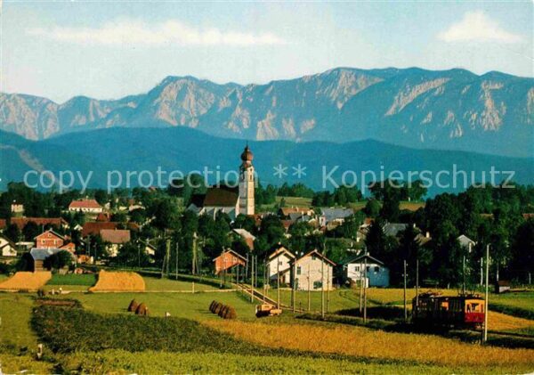 St Georgen Attergau Ortsansicht mit Kirche Blick zum Höllen