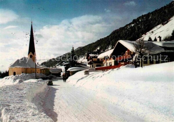 Balderschwang Berghotel Hubertus Ortsansicht mit Kirc