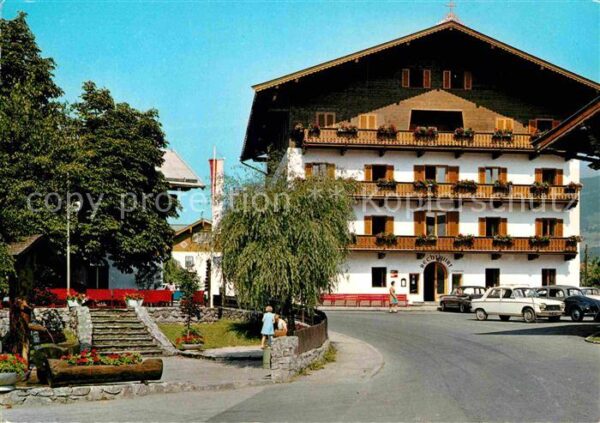 Kirchberg Tirol Strassenmotiv Bechlwirt Dorfbrunnen Mus