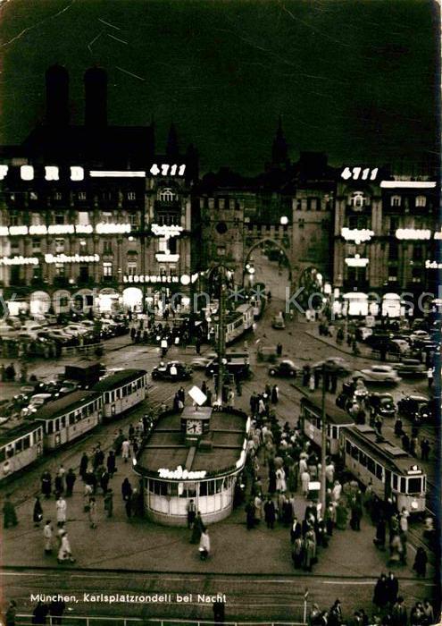Muenchen Karlsplatzrondell bei Nacht
