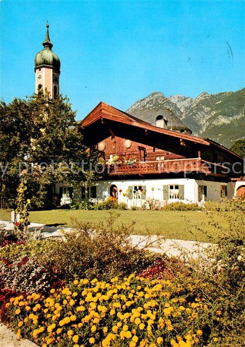 Garmisch-Partenkirchen Pfarrkirche mit altem Bauernhaus