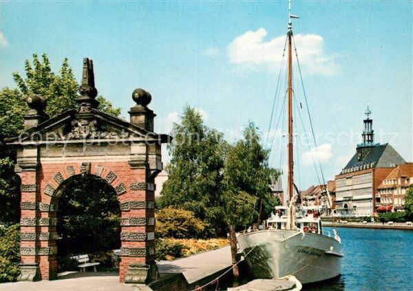 Emden Ostfriesland Hafentor und Rathaus Segelboot