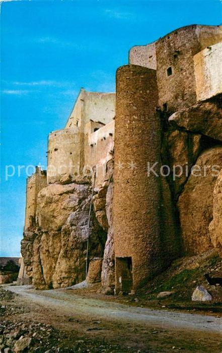 M zab A tower in the surrounding wall of Boun
