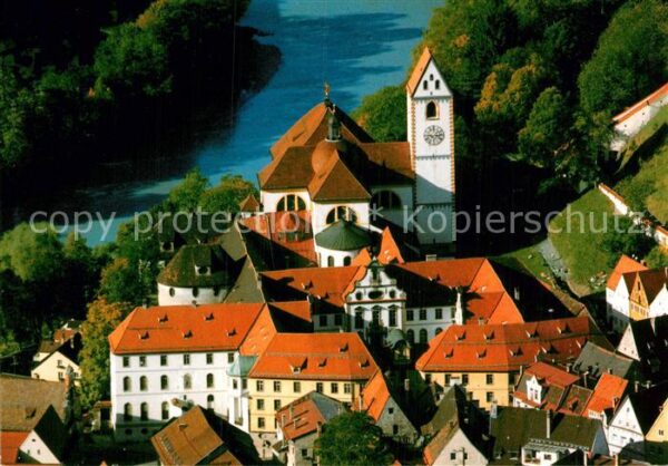 Fuessen Allgaeu Stadtpfarrkirche St Mang mit ehem Bened