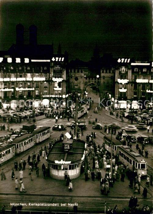 Muenchen Karlsplatzrondell bei Nacht