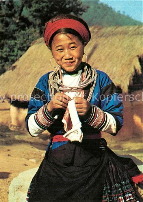 Typen Vietnam Embroidering a Jacket Red Meo