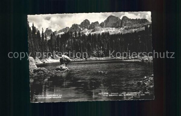 Karersee Suedtirol mit Rosengarten-Gruppe
