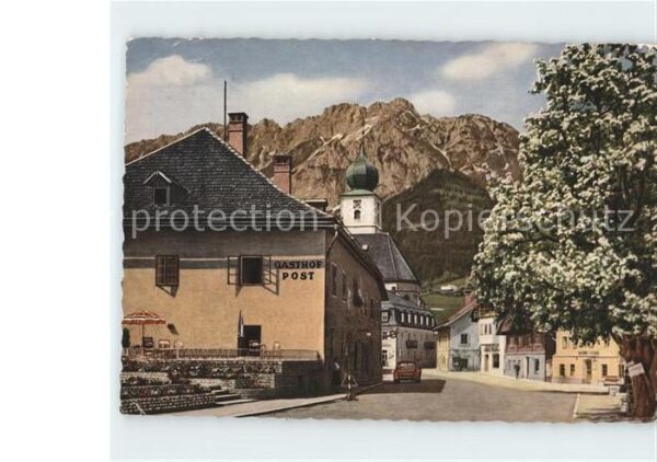 Groebming Steiermark Hauptplatz mit Kamm Baumblüte