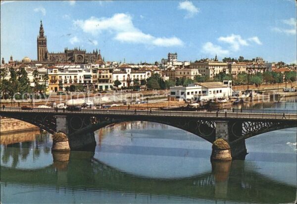 Sevilla Andalucia Puerto de Triana y vista parcial Catedr
