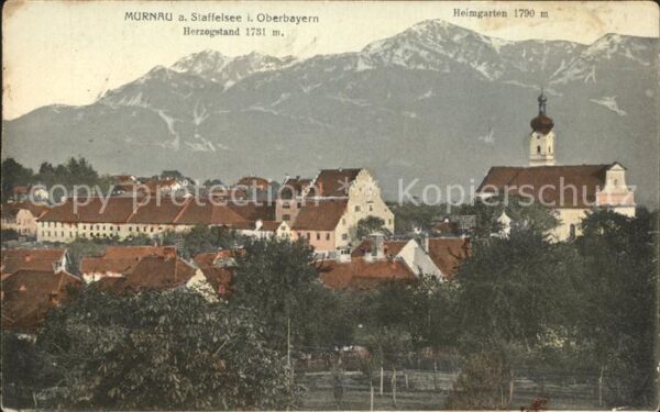 Murnau Staffelsee Ortsansicht mit Kirche Herzogstand Heim