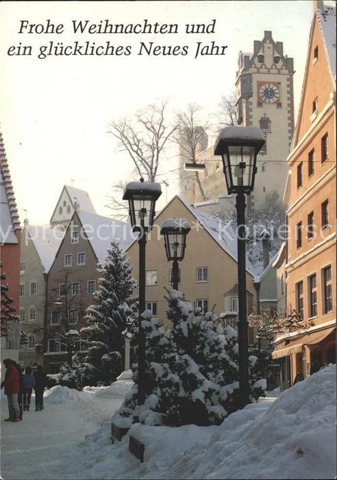 Fuessen Allgaeu Fussgängerzone im Schnee mit Hohes Schl