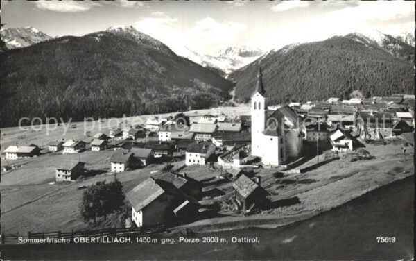Obertilliach Ortsblick mit Kirche und Porze