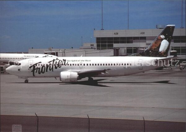 Flugzeuge Zivil Frontier Puffin bird tail. Boeing 737-3