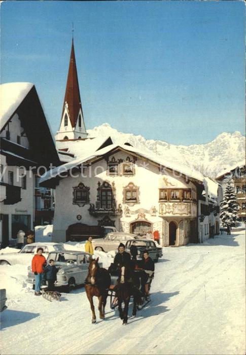 Seefeld Tirol Dorfmotiv mit Wetterstein Pferdeschlitt