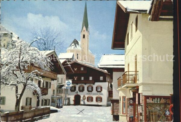 Kirchberg Tirol Ortspartie an der Kirche Gasthof im Win