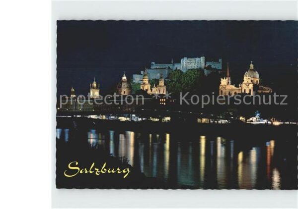 Salzburg Oesterreich Festspielstadt bei Nacht