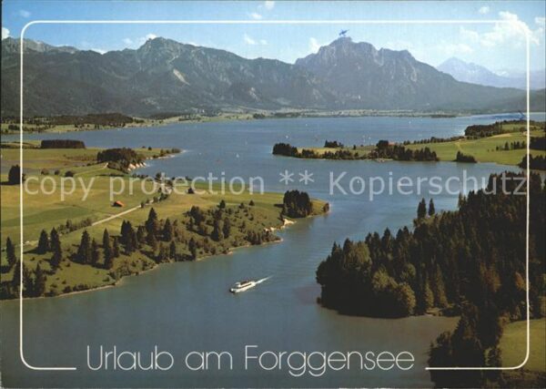 Fuessen Allgaeu Forggensee mit Blick gegen Tegelberg un
