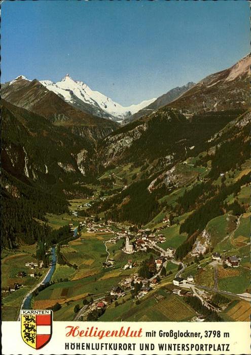 Heiligenblut Kaernten Panorama mit Grossglockner Alpen Wappen