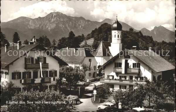 Kochel See Ortsansicht mit Kirche Herzogstand Baye