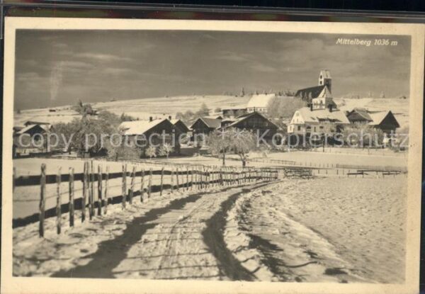 Mittelberg Vorarlberg Ortsansicht mit Kirche im Winter
