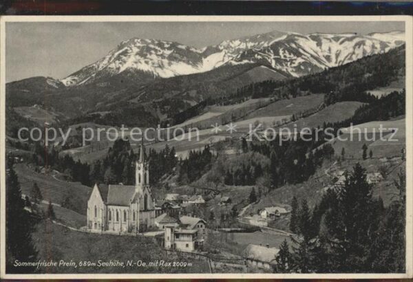 Prein Rax Ortsansicht mit Kirche und Alpen