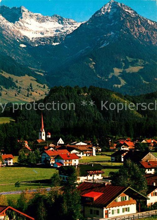 Fischen Allgaeu Ortsansicht mit Kirche Blick zum Rubiho