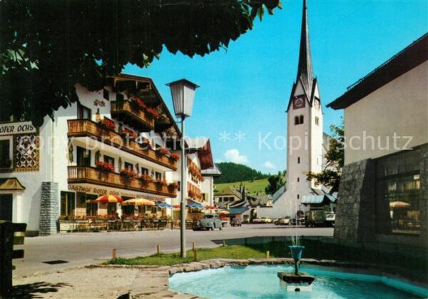 Abtenau Marktplatz Brunnen Kirche Gasthof
