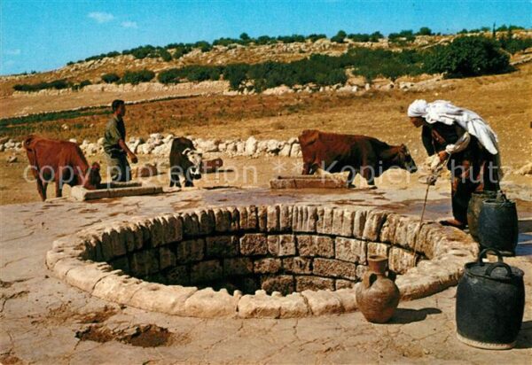 Jerusalem Yerushalayim Arab woman drawing water from a well