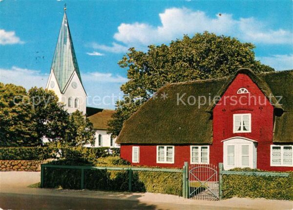 Nebel Amrum St Clemenskirche mit Friesenhaus