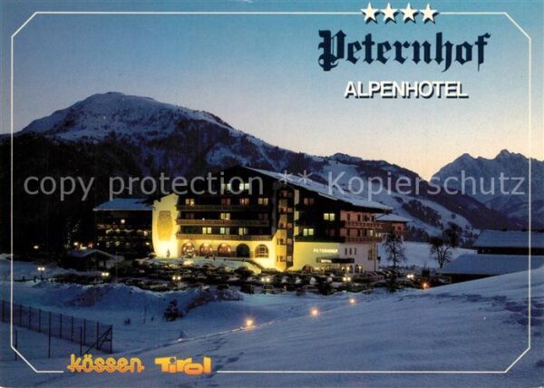 Koessen Tirol Alpenhotel Peternhof im Winter Abendsti